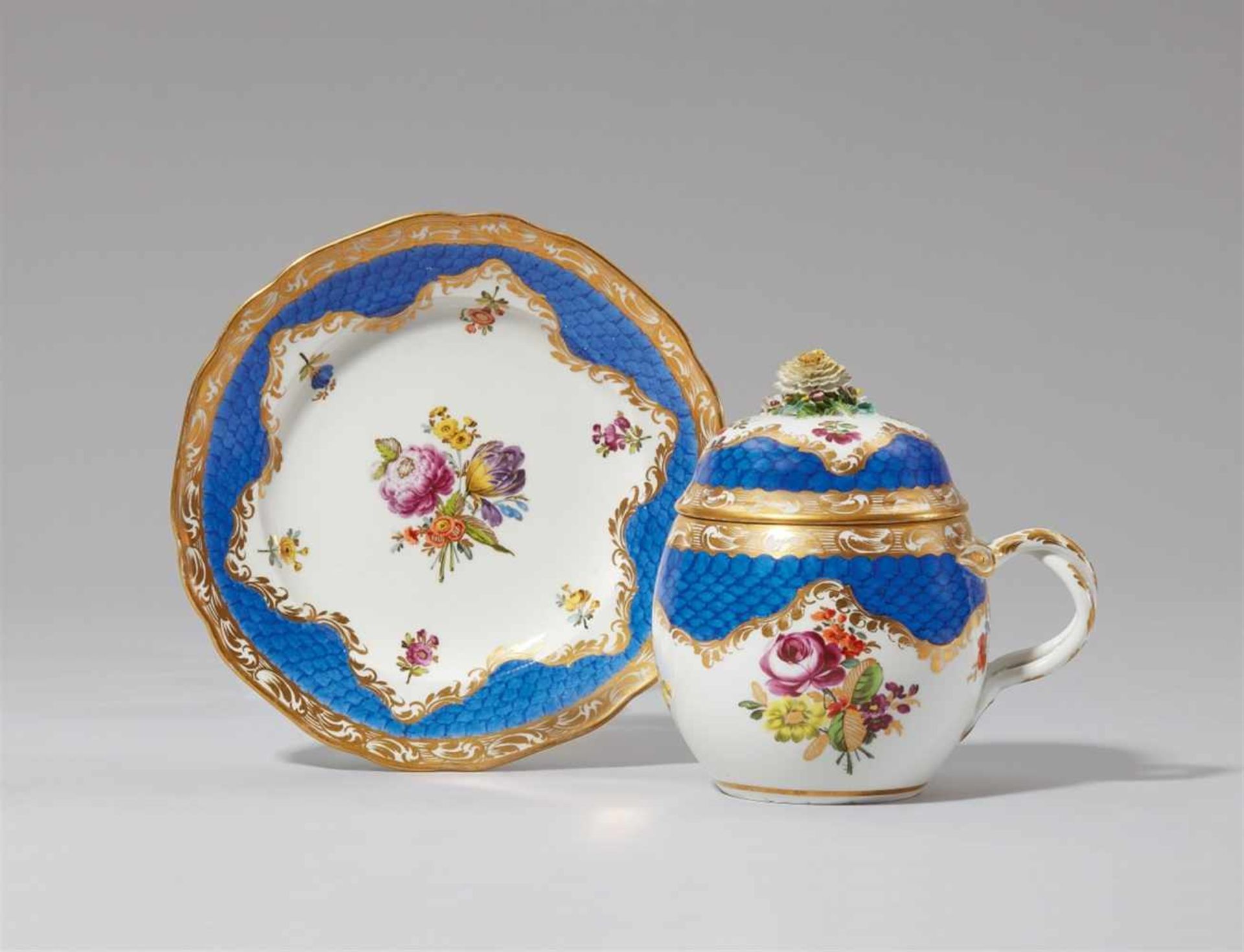 A large Vienna porcelain bouillon mug and saucerOf bombé form with curved branch handles, original