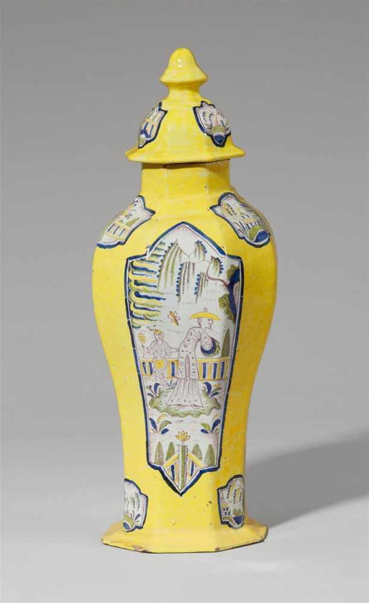 A yellow Zerbst faience vase and cover with Chinoiserie decorNarrow baluster-form vase with