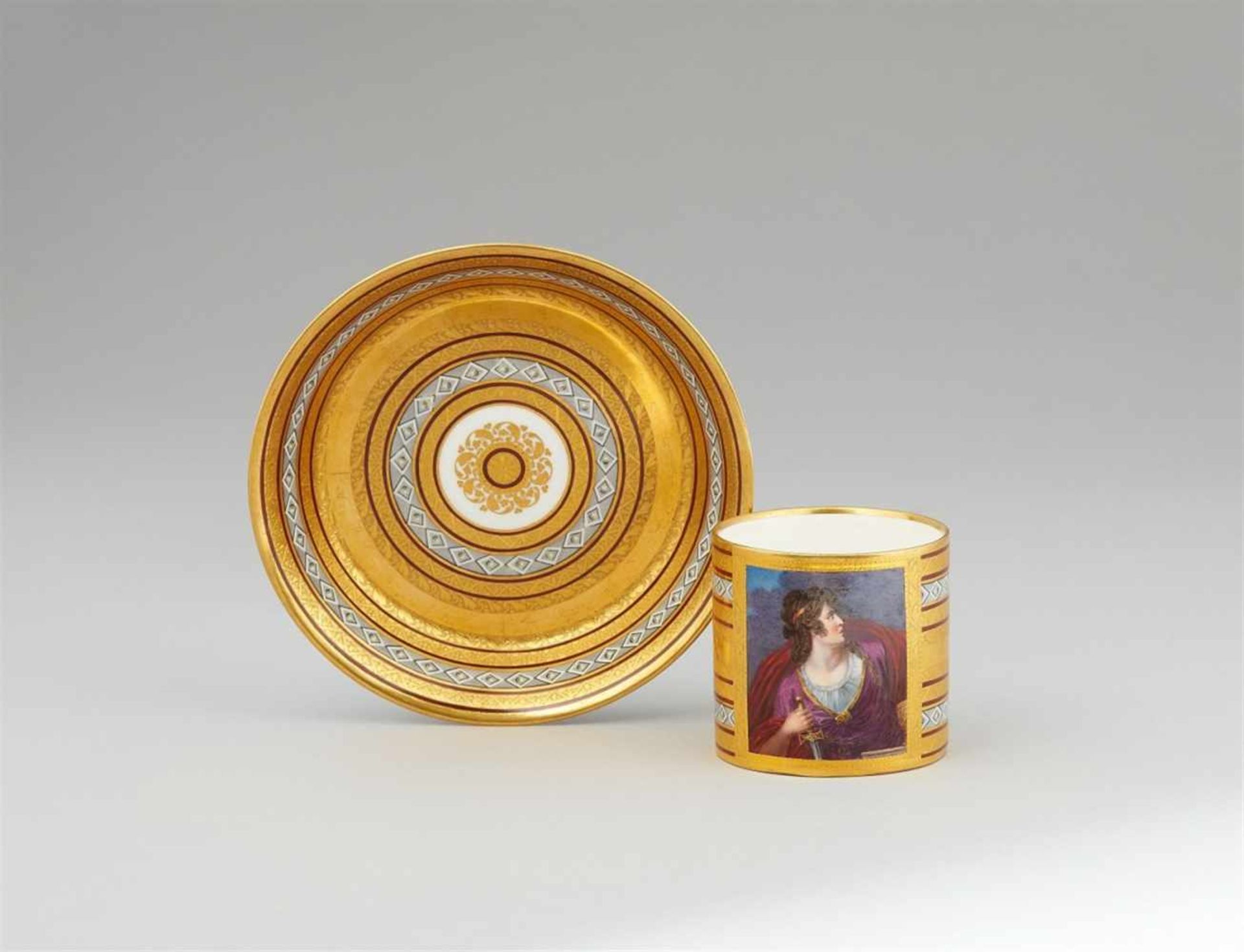 A Vienna porcelain cup and saucer with a depiction of Adelaide from LotarioOf cylindrical form