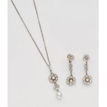 An 18k white gold, diamond and Oriental pearl pendant and earringsDesigned as festoons of