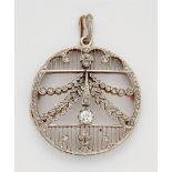 A Belle Epoque 14k gold and diamond pendantPlatinum and 14k gold pendant designed as a delicately