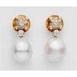 A pair of 18k gold, pearl and fancy diamond earringsStud earrings each set with a small natural