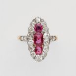 A Belle Epoque diamond and ruby ringPlatinum and 18k gold ring with diamond set shoulders and a