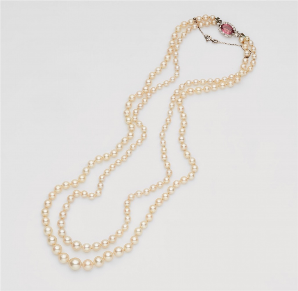 A French pearl necklace with a diamond and rubelite claspA two-stranded pearl necklace comprised - Image 3 of 3