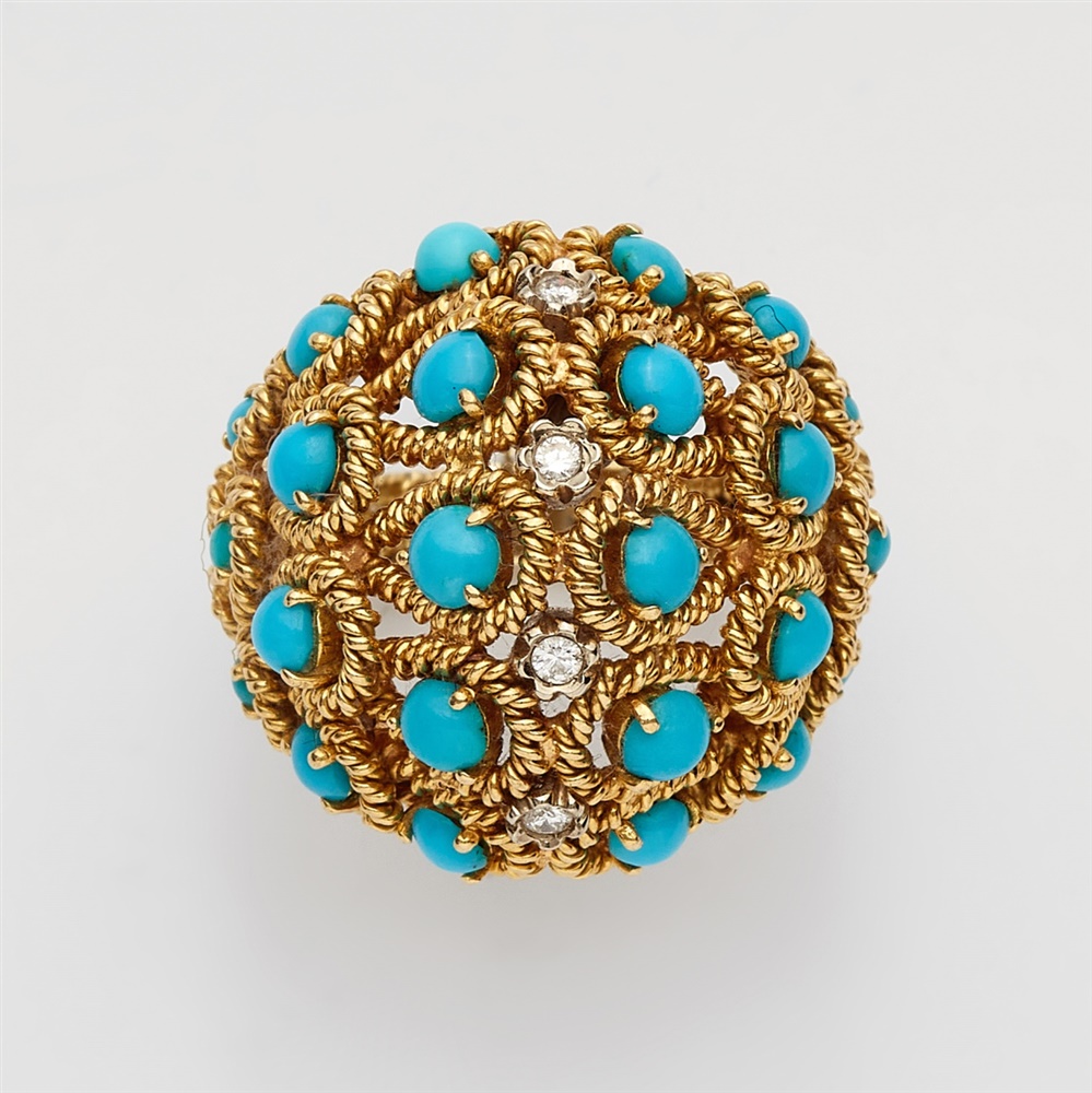 An 18k gold and turquoise basket ringThe ring band and the domed bezel with braided decor, set