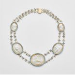 A Neoclassical 18k gold cameo necklaceTwo-stranded necklace designed as a garland of rosette-