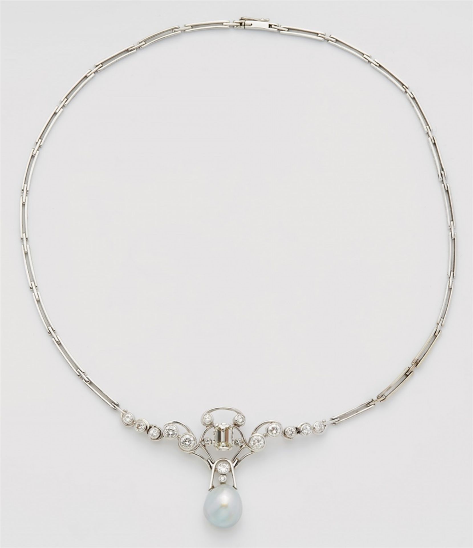 A 14k white gold diamond and pearl necklaceThe central curved motif formed from gold wire and set