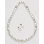 A South Sea pearl necklace and matching pair of earringsA strand of 39 slightly graduated Australian