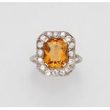 An Art Deco diamond and citrine ring18k white gold and platinum ring, the rectangular bezel