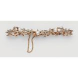 A Belle Epoque Oriental pearl and diamond bracelet14k red gold and platinum bracelet designed as a