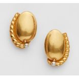 A pair of 18k gold clip earrings with granulationHollow gold earrings shaped like plums with