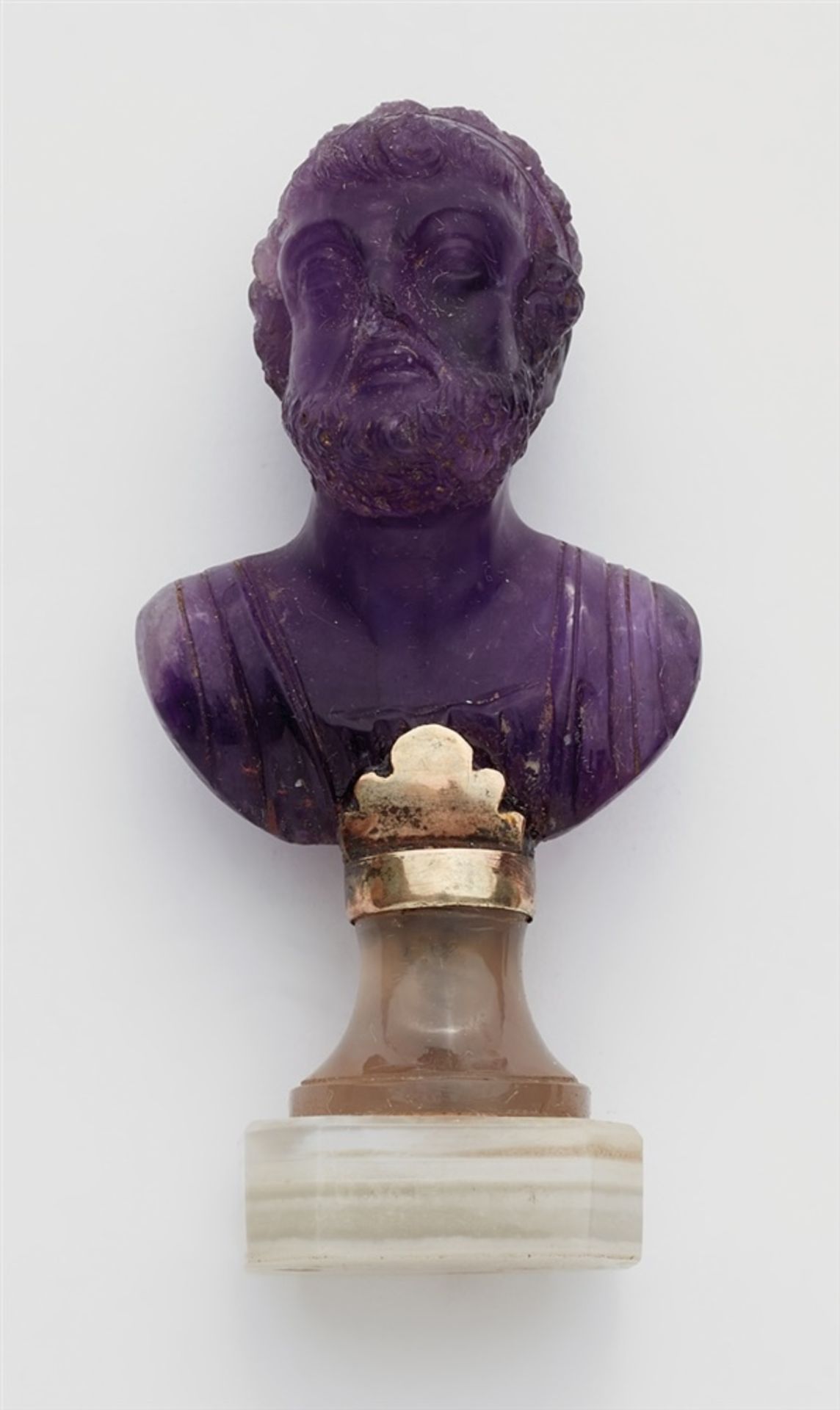 A carved amethyst bust of Homer as a souvenir of the Grand TourSilver-plated metal, amethyst, agate.