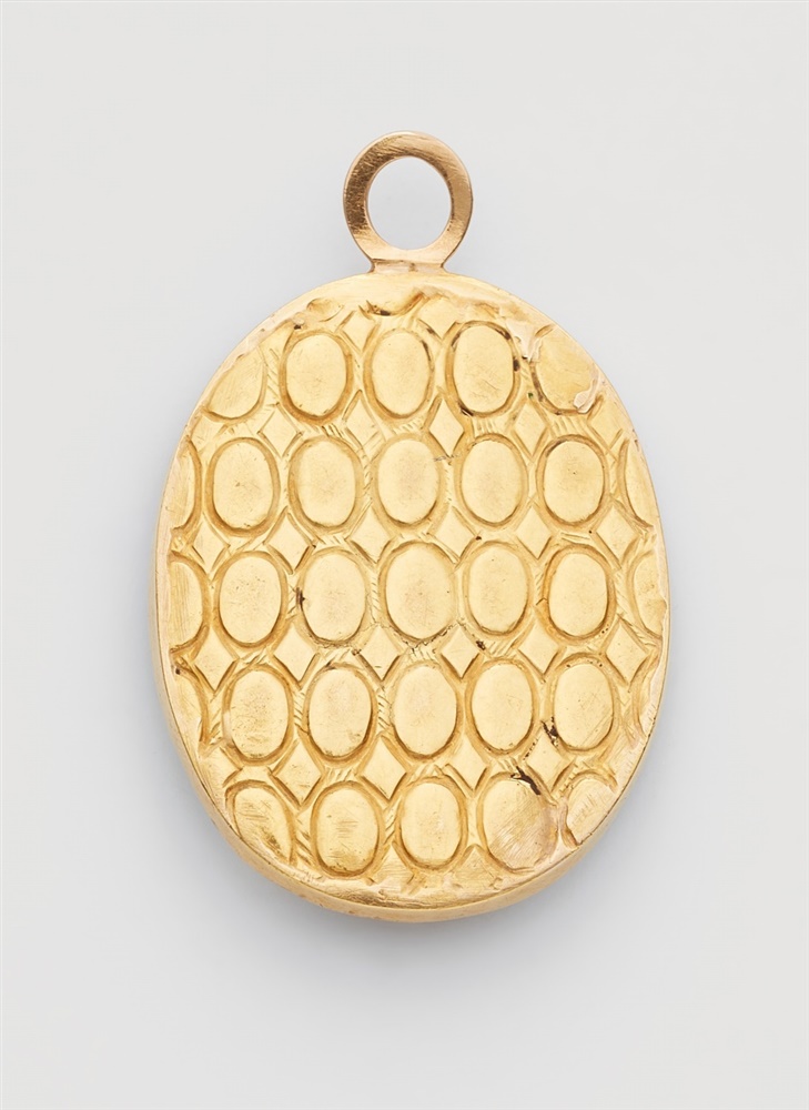 An 18k gold and agate cameo pendantThe oval layered onyx cameo (33 x 27 mm) carved in relief with - Image 2 of 2