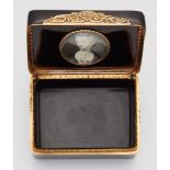 A tortoiseshell snuff box with a portrait miniatureRectangular gilt copper and tortoiseshell snuff