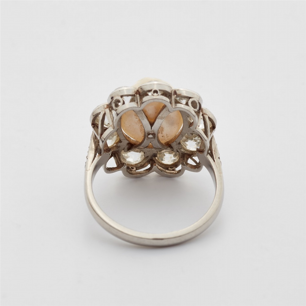 A Belle Epoque diamond and pearl ringA platinum ring with diamond set shoulders and a flower- - Image 3 of 3