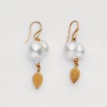 A pair of 18k gold earrings with Baroque pearlsTwo fancifully formed heart-shaped cultured pearls (