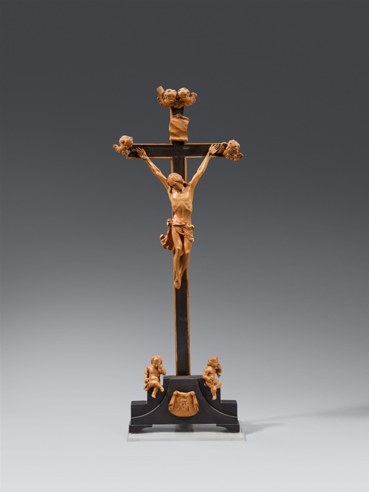 An 18th century South German carved wooden crucifixion sceneThe figures carved from boxwood and