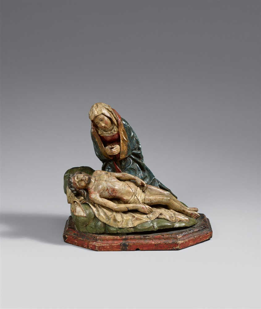 A Cologne carved wooden pietà group, around 1480/1490Carved in the round, the reverse only partially