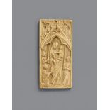A French carved ivory relief of the Virgin and Child, second half 14th centurycarved ivory. The