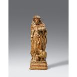 An early 16th century Mechelen figure of Saint AnthonyCarved three-quarters in the round, the