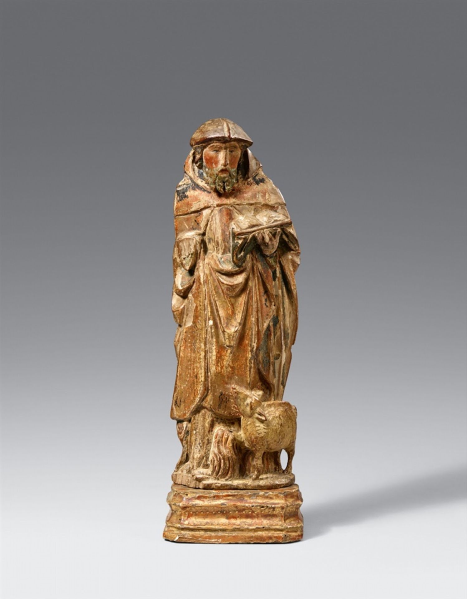 An early 16th century Mechelen figure of Saint AnthonyCarved three-quarters in the round, the