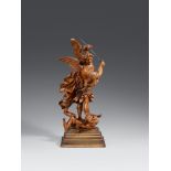 A Bavarian carved boxwood figure of Saint Michael, around 1700Carved in the round and partially