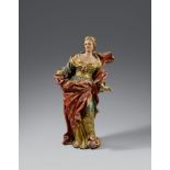 An 18th century carved wood figure of Catherine of Alexandria, presumably SpanishCarved in the