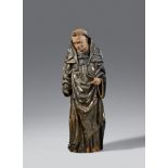 A South Tirolean carved wooden figure of a standing saint (possibly Saint Leonard), around