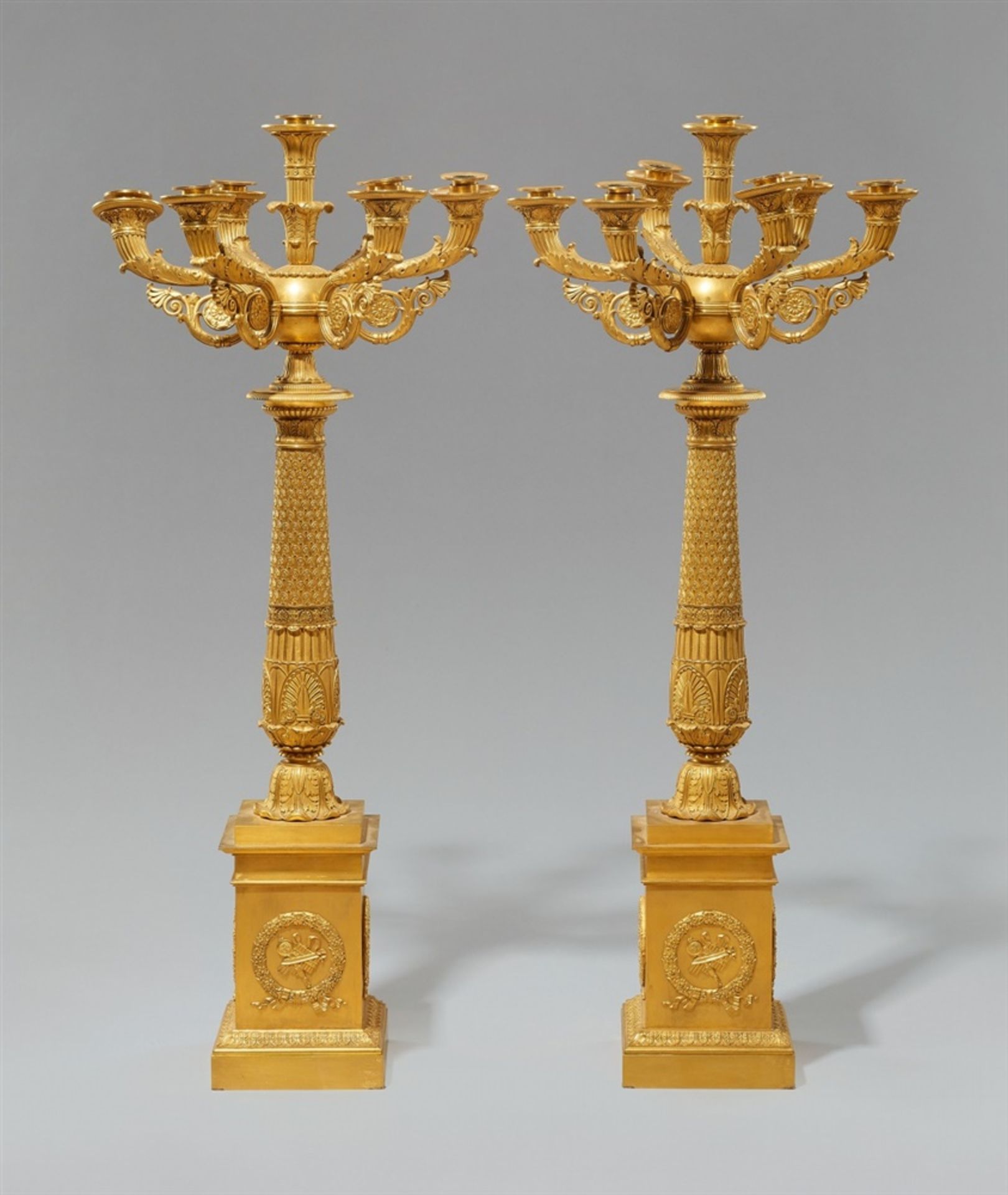 A pair of Empire table candelabra from the Château de NeuillyOrmolu candelabra made from several