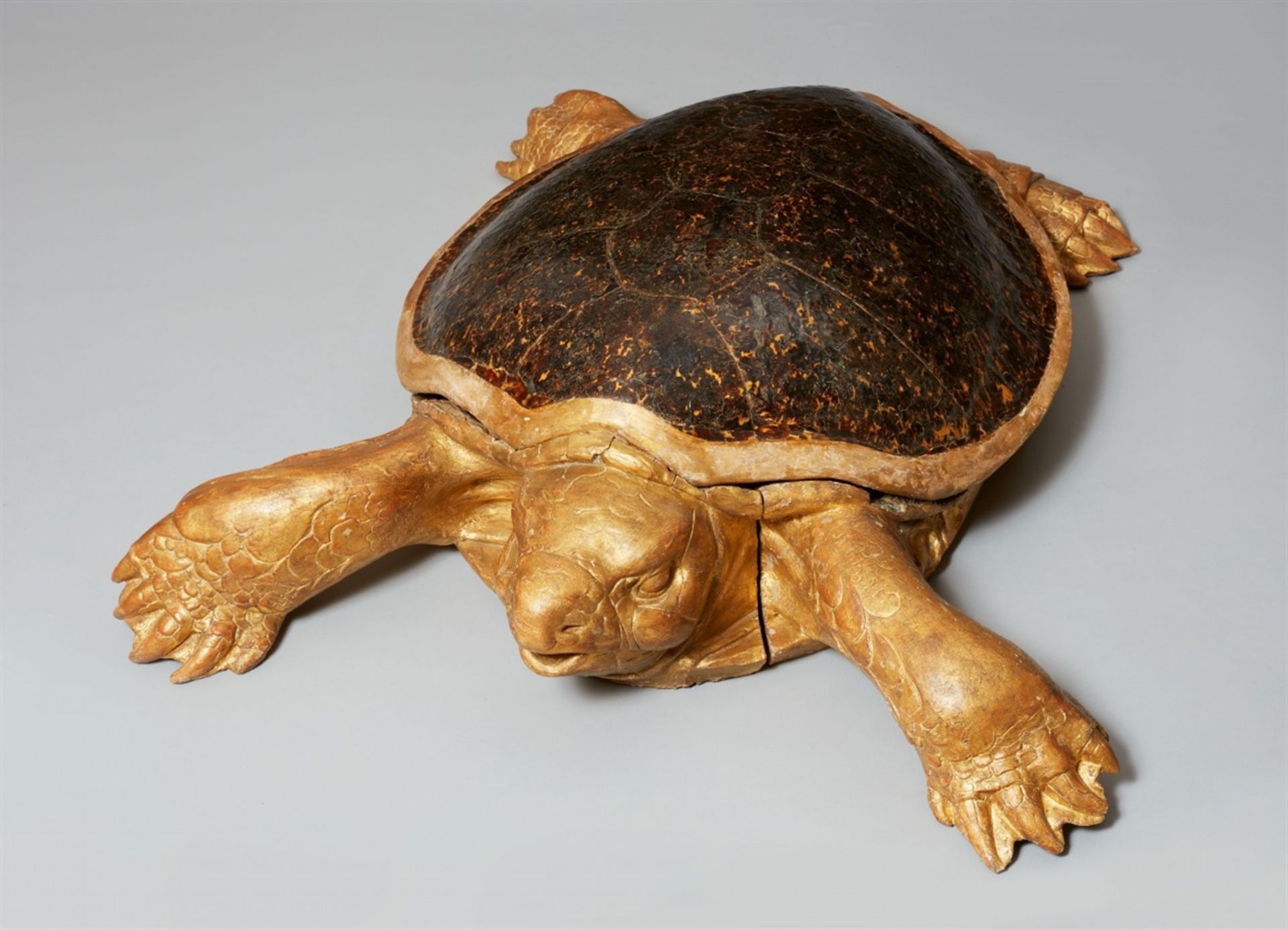 Monumental model of a turtleLife-sized model of a giant turtle; the head and legs made from gilded