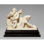 A white marble group of Venus and CupidOn an ebonised wood base. Venus is depicted with long flowing