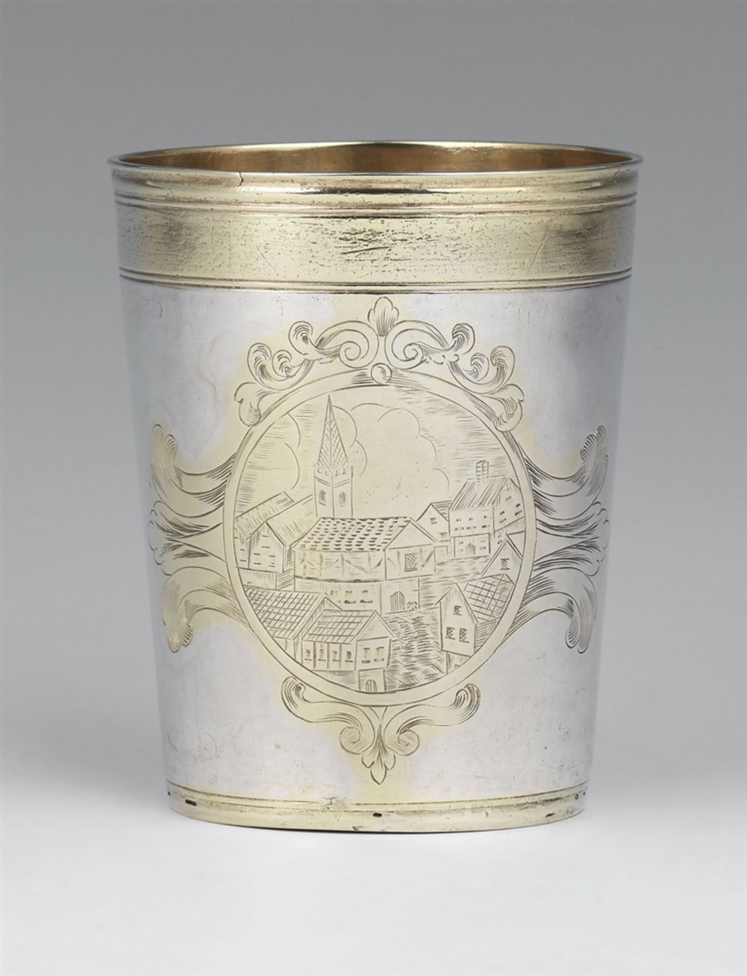 A silver beaker made for the Barons von SeckendorffParcel-gilt beaker of tapering cylindrical