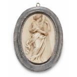 A pair of marble plaques with allegorical figuresOval white marble plaques in a pale grey frame. One