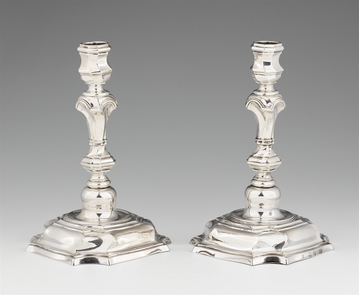 A pair of Hameln silver candlesticksSilver Moulded baluster-form shafts with twist fluting issuing