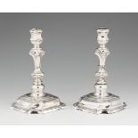 A pair of Hameln silver candlesticksSilver Moulded baluster-form shafts with twist fluting issuing