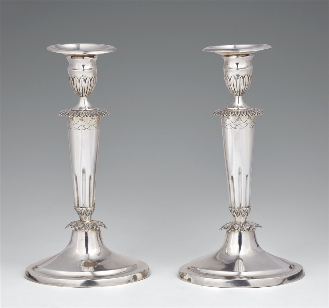 A pair of Mainz silver candlesticksSilver. Tapering column shafts resting on oval bases. Stamps: