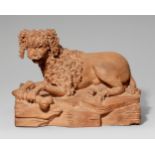 A terracotta model of a poodle with a boneDepicting a shorn poodle lying on a stone plinth holding a