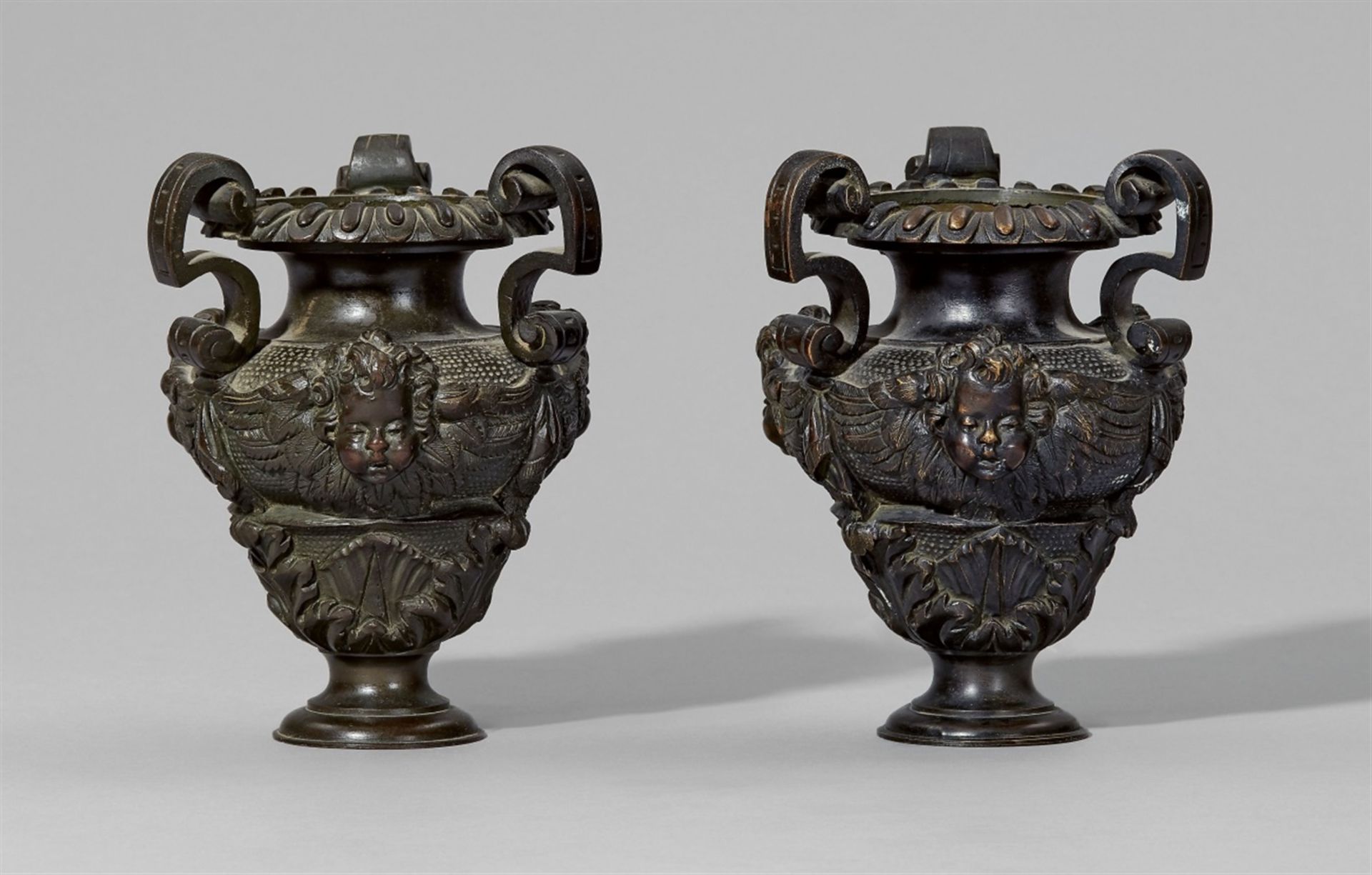 Vases from a pair of andironsCast bronze with dark brown patina. Baluster-form vases with angel's - Bild 2 aus 2