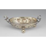 A large Hamburg silver brandy bowlSilver; partly gilded. A parcel-gilt silver bowl on three