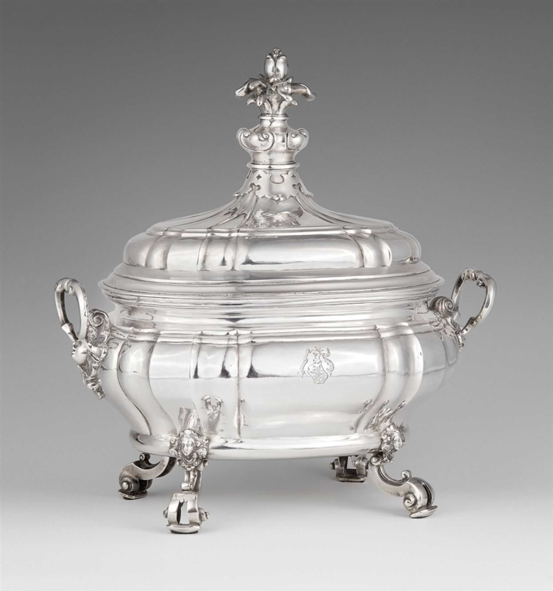 A large Riga silver tureenSilver; gold-plated inside. A large fluted oval tureen with gilt