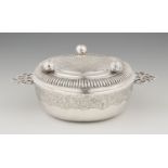 An Osnabrück silver ecuelleSilver. A slightly tapering dish with pierced handles and engraved