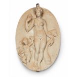 A white marble relief plaque with Venus and CupidRough white marble plaque with a depiction of Venus