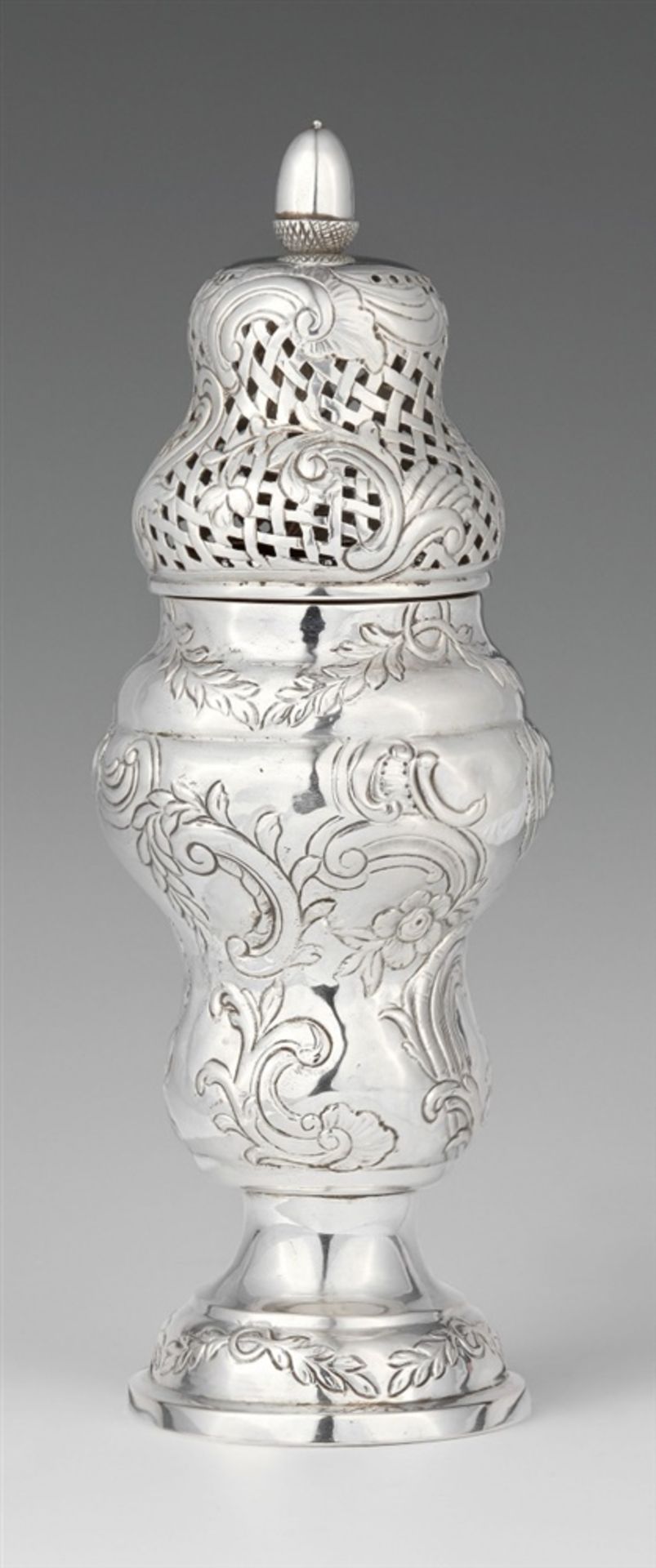 A Rococo silver sugar casterBaluster-form form sugar caster with chased floral and scrolling