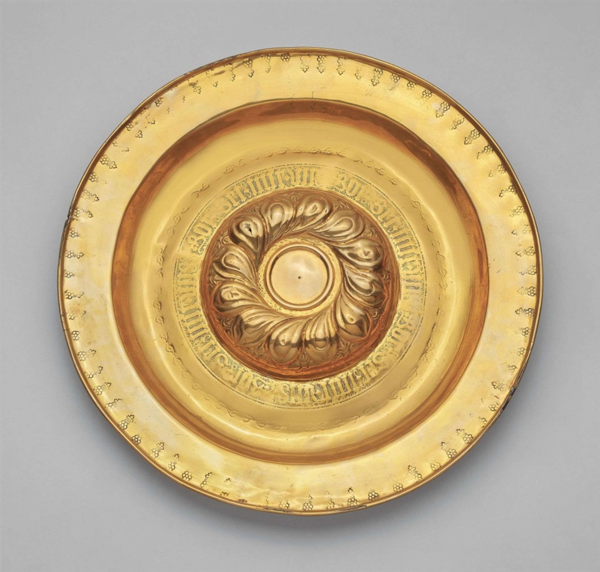 A Nuremberg brass “beckenschlägerschüssel”Embossed brass bowl with tracery in bas relief, the rim