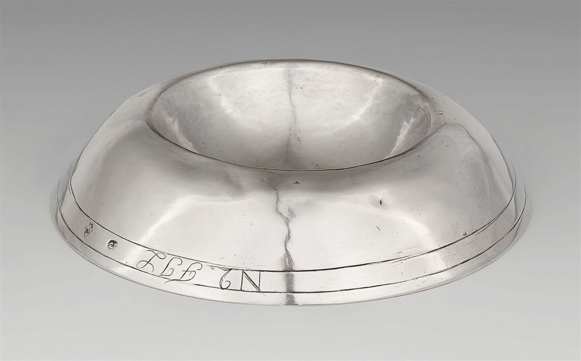 A rare Kerpen silver saltSilver A smooth semi-spherical salt dish with refined engraved décor.