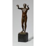 A bronze reproduction of the so-called “Praying Boy”Cast bronze sculpture with fine chocolate