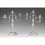 A pair of Braunschweig silver candelabraSilver. Baluster-form shafts with shellwork décor and