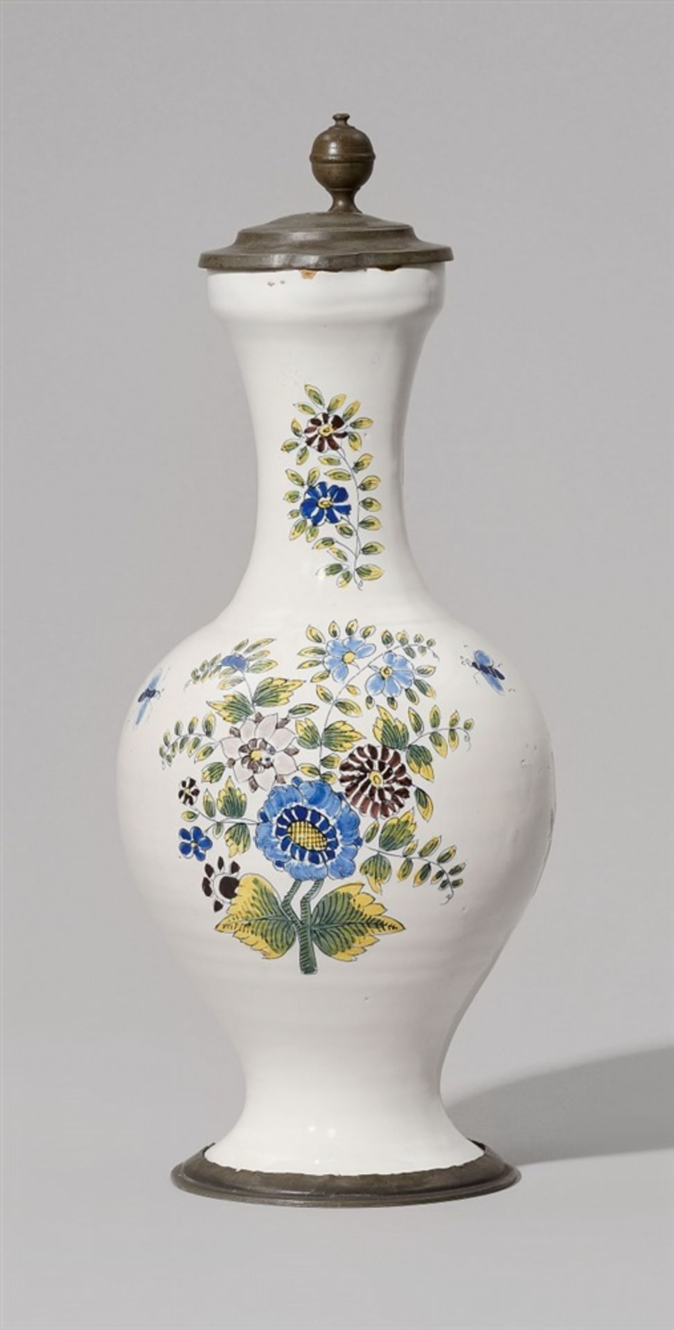 A Künersberg faience tankardDecorated to the display side with a bouquet of “indianische blumen” and