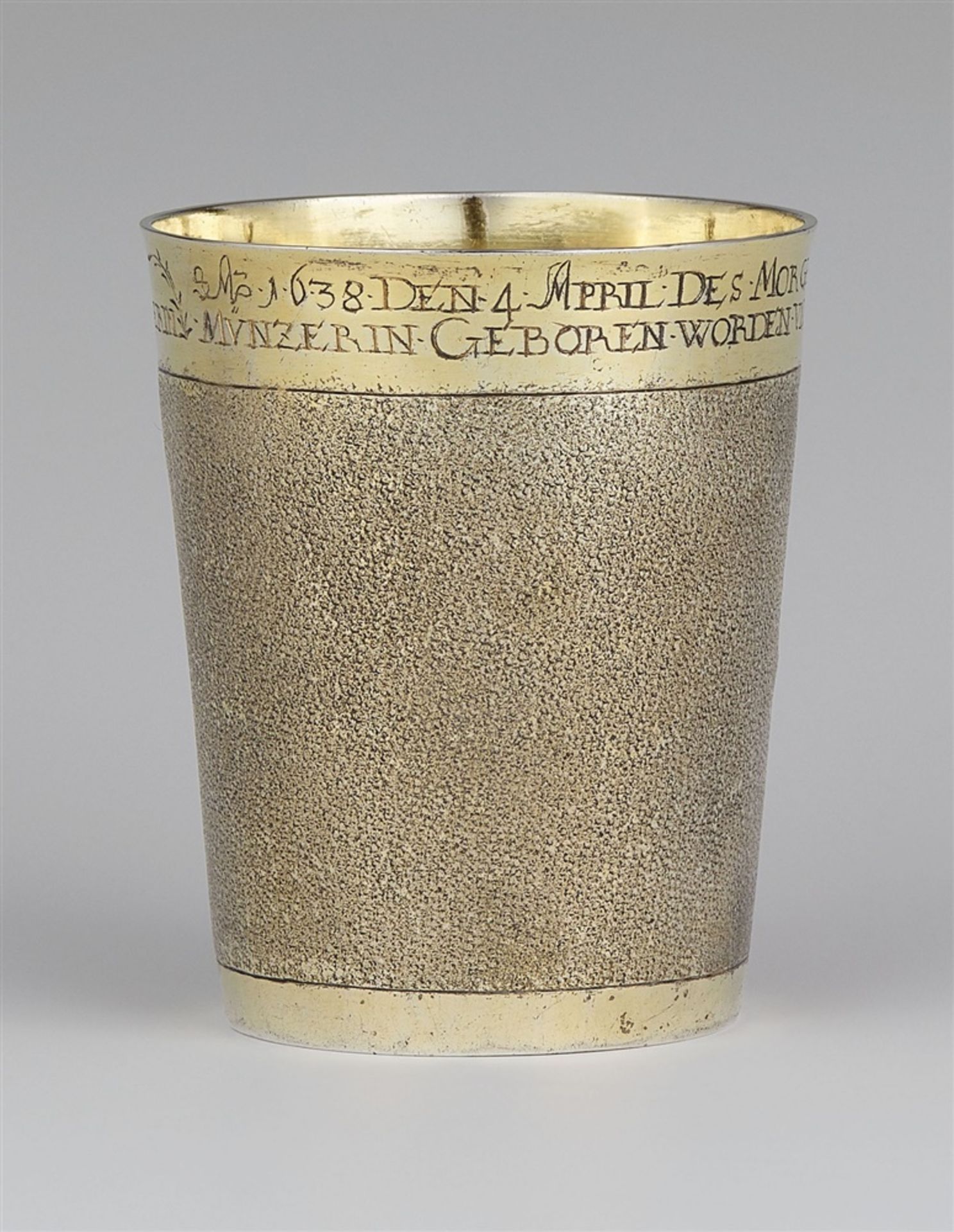 A rare Memmingen silver christening beakerCylindrical silver-gilt beaker with snakeskin pattern