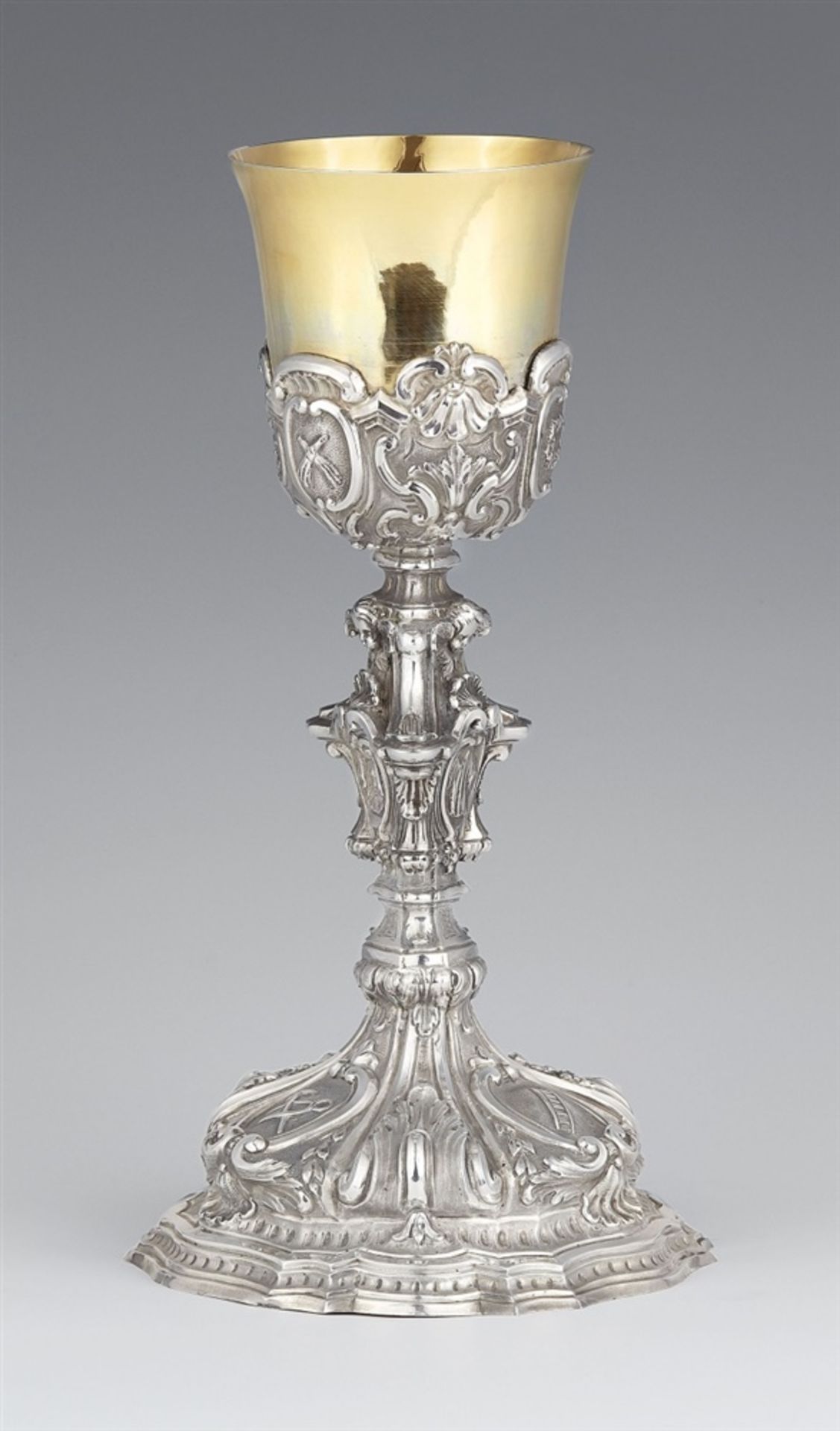 A Roman silver communion chaliceParcel-gilt silver chalice, the domed foot decorated with finely